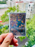 Dhelmise 091/084 - NM Inglés