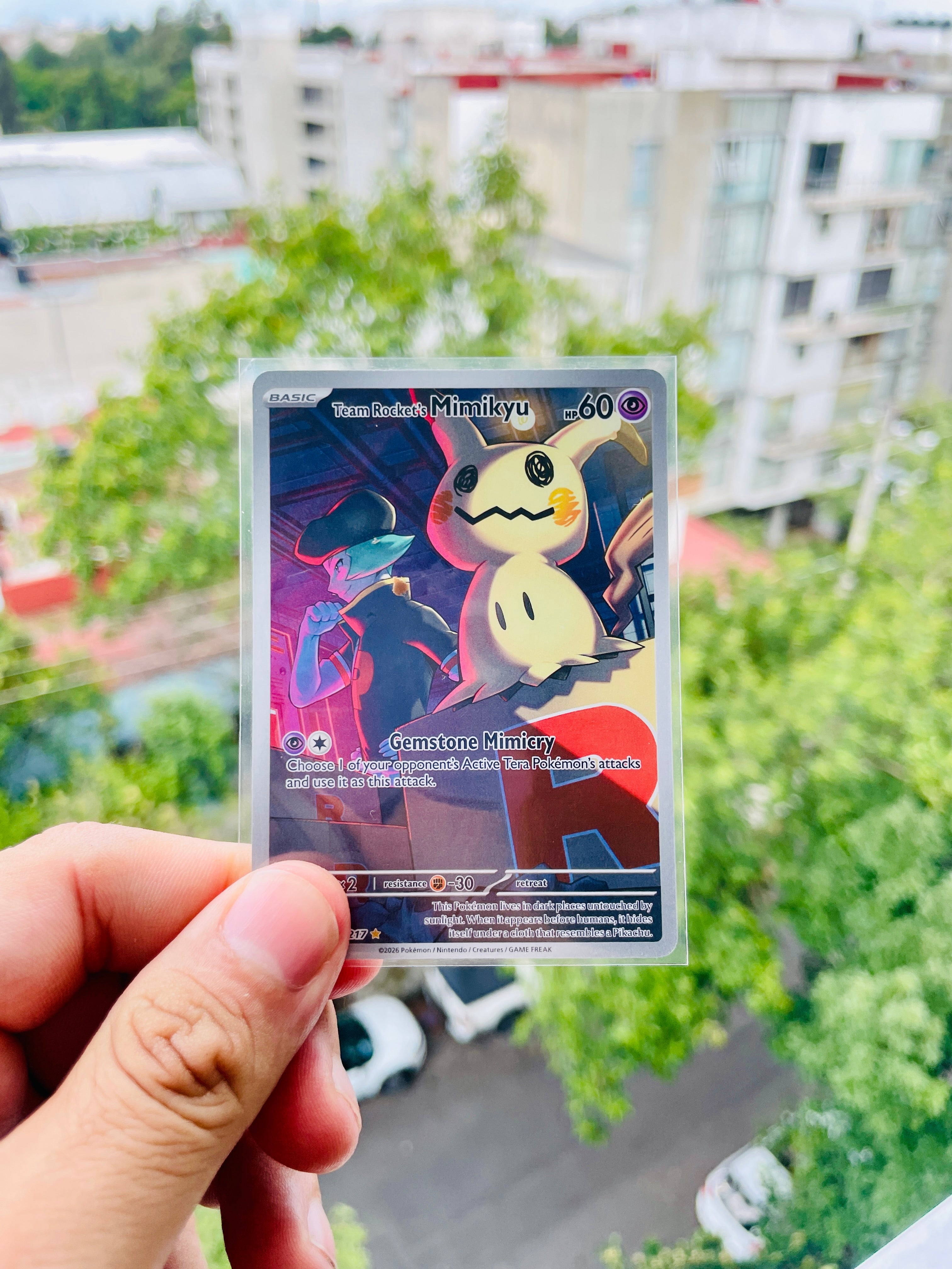 Team Rocket's Mimikyu 238/217 - NM Inglés